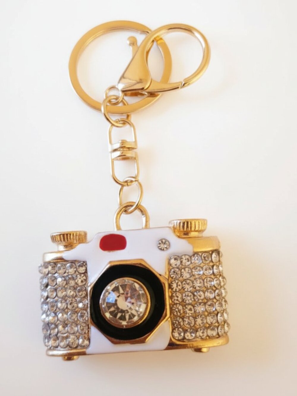 Gold-toned rhinestone blinged out old fashioned camera keychain. Brand new.